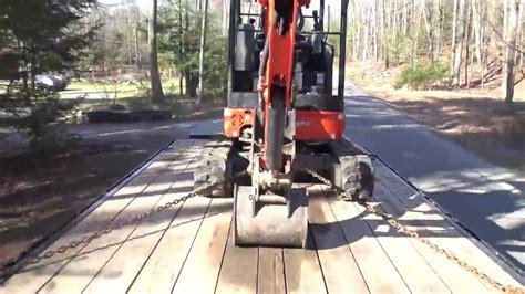 how to tie down mini excavator|how to tie down an excavator.